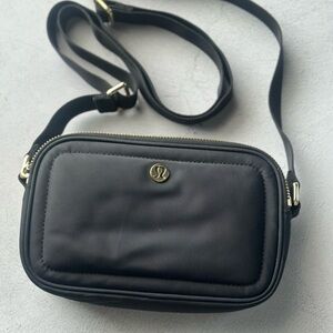 lululemon athletica Black Crossbody Bag with Gold Details
